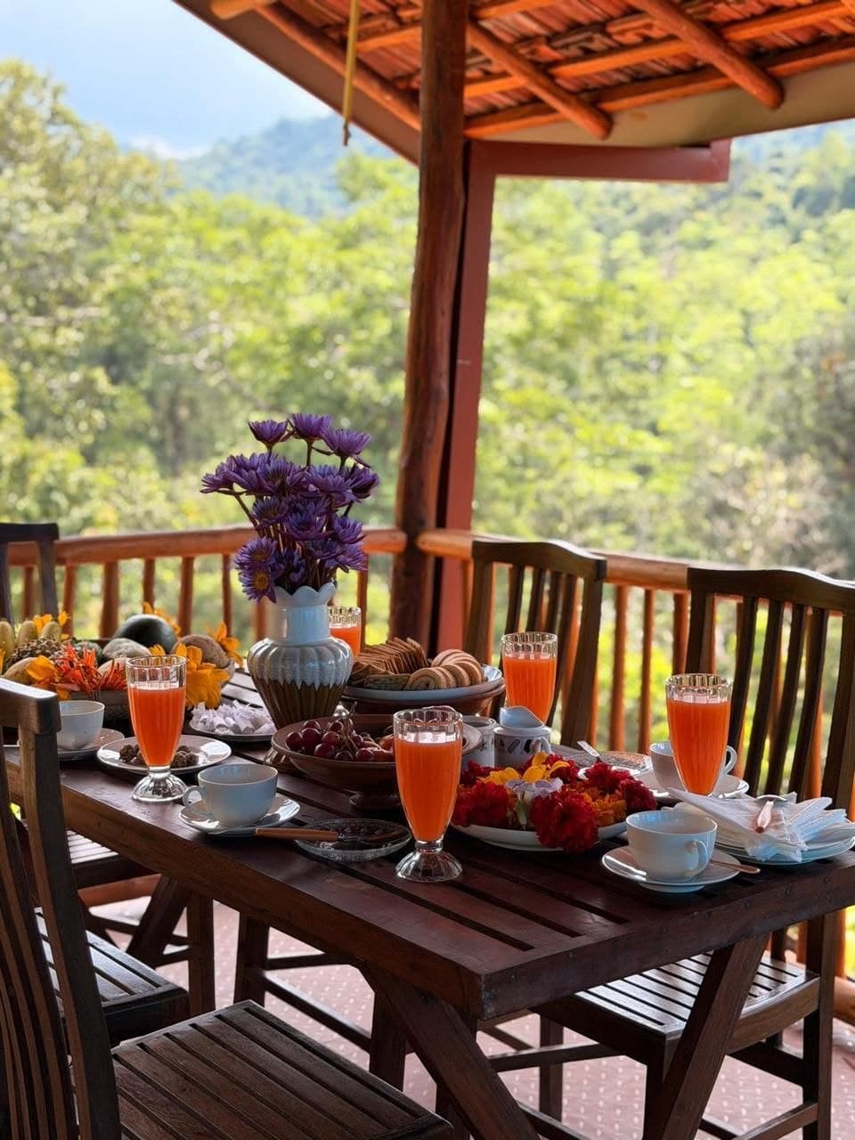 Fresh fruits, juices & breakfast overlooking morning mist