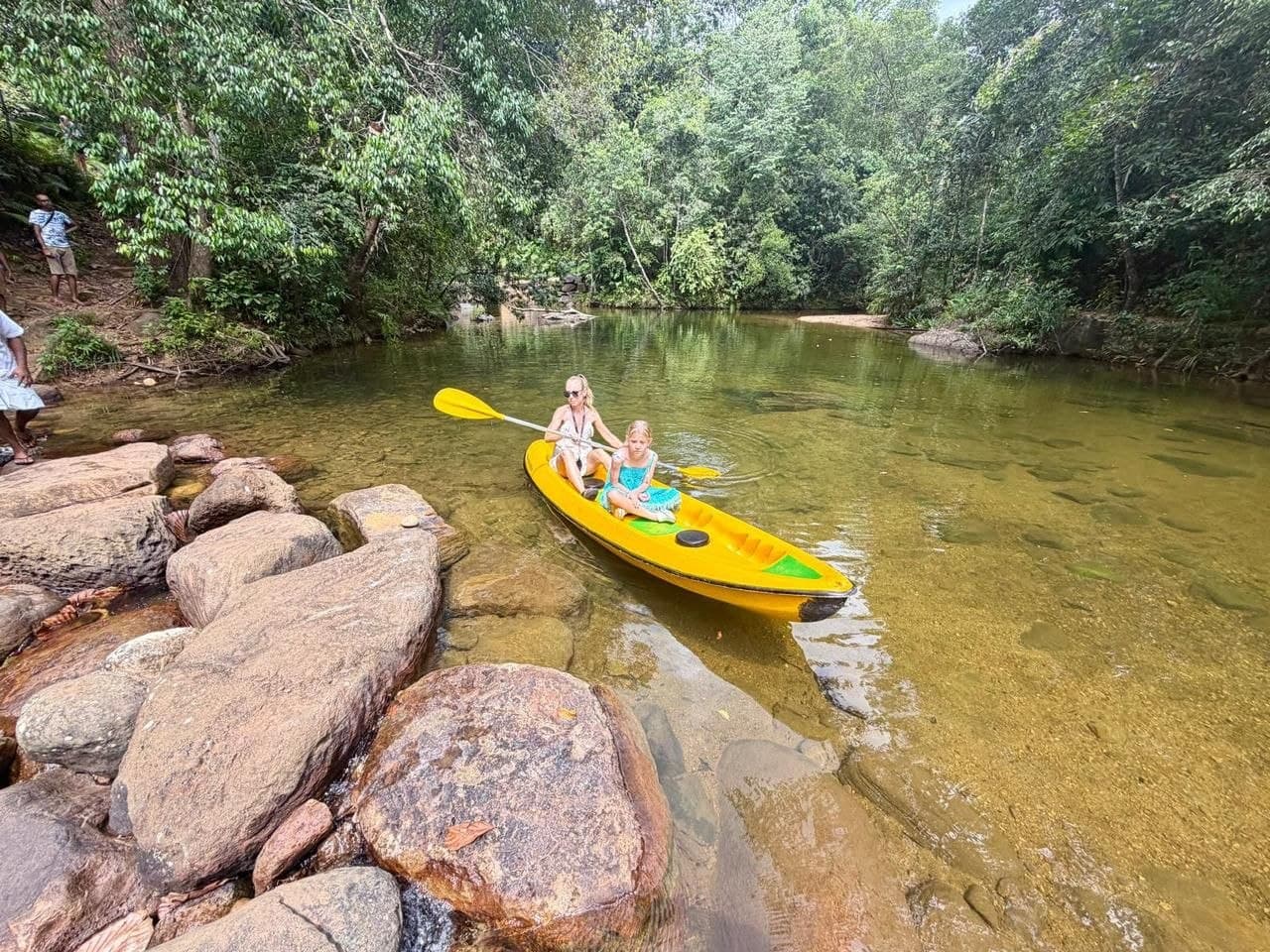 Kayaking and rafting through peaceful rainforest bends